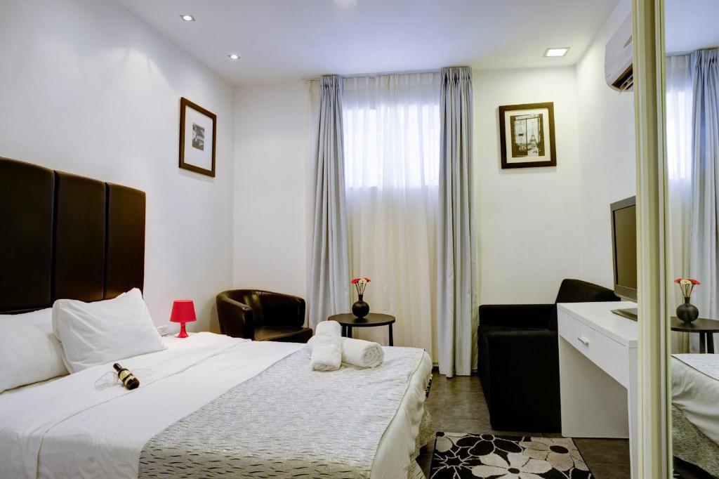 Geula Suites By Raphael Hotels Тел Авив Стая снимка